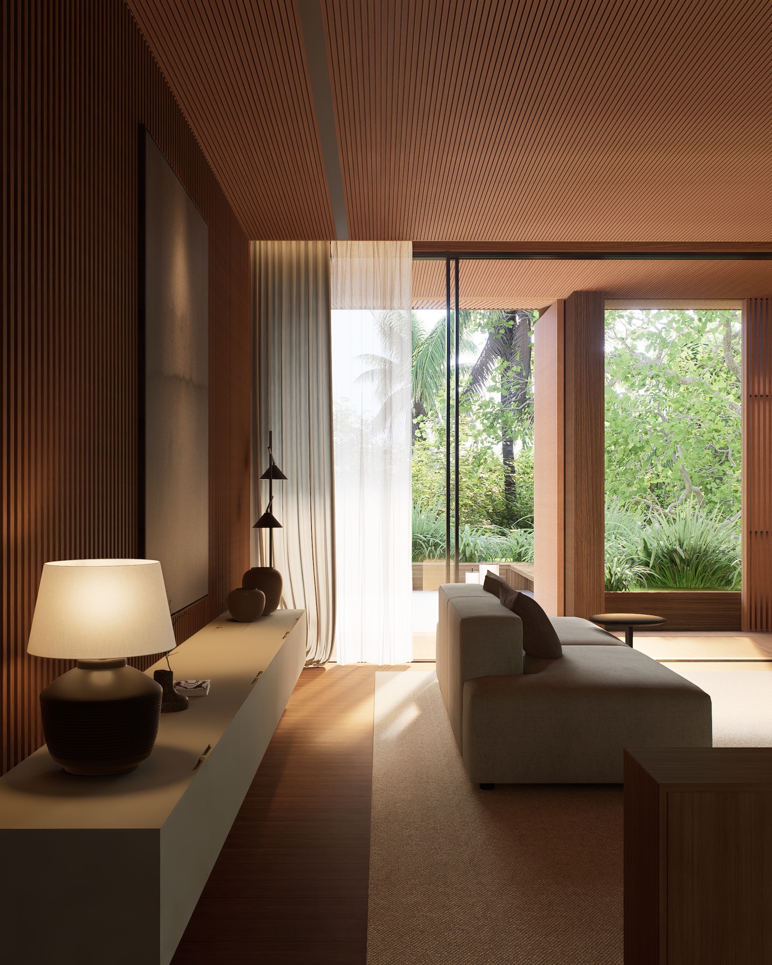 View of arrival to master bedroom at tatma residence showing sofa, outdoor garden view, and hanging cabinet