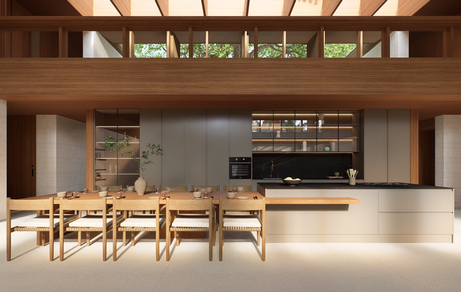 Kitchen and dining space at tatma residence with solid wood table and toto kitchen island