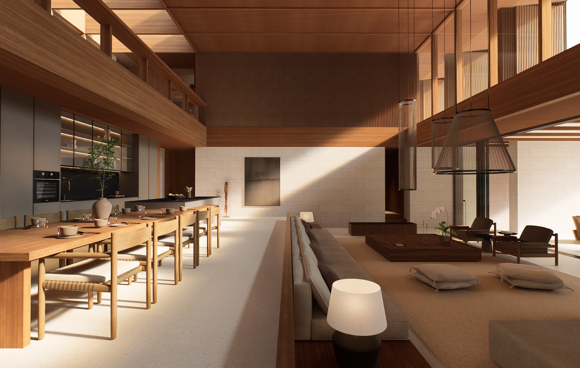 View of the great room at tatma residence showing double height ceiling, steps down towards the living room, and kitchen and dining space