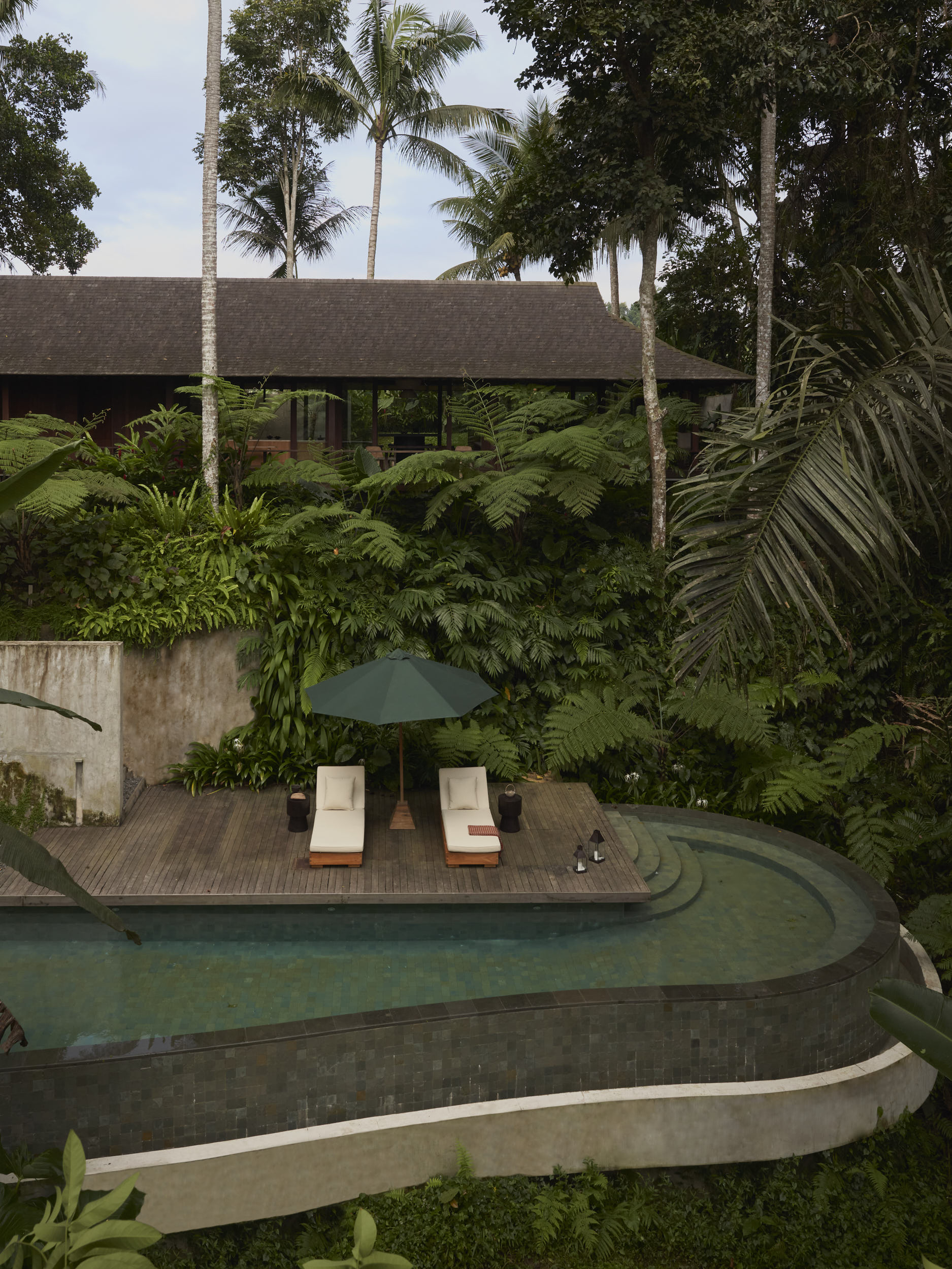 Portrait verview of Rumah Haruku from the valley looking towards the house