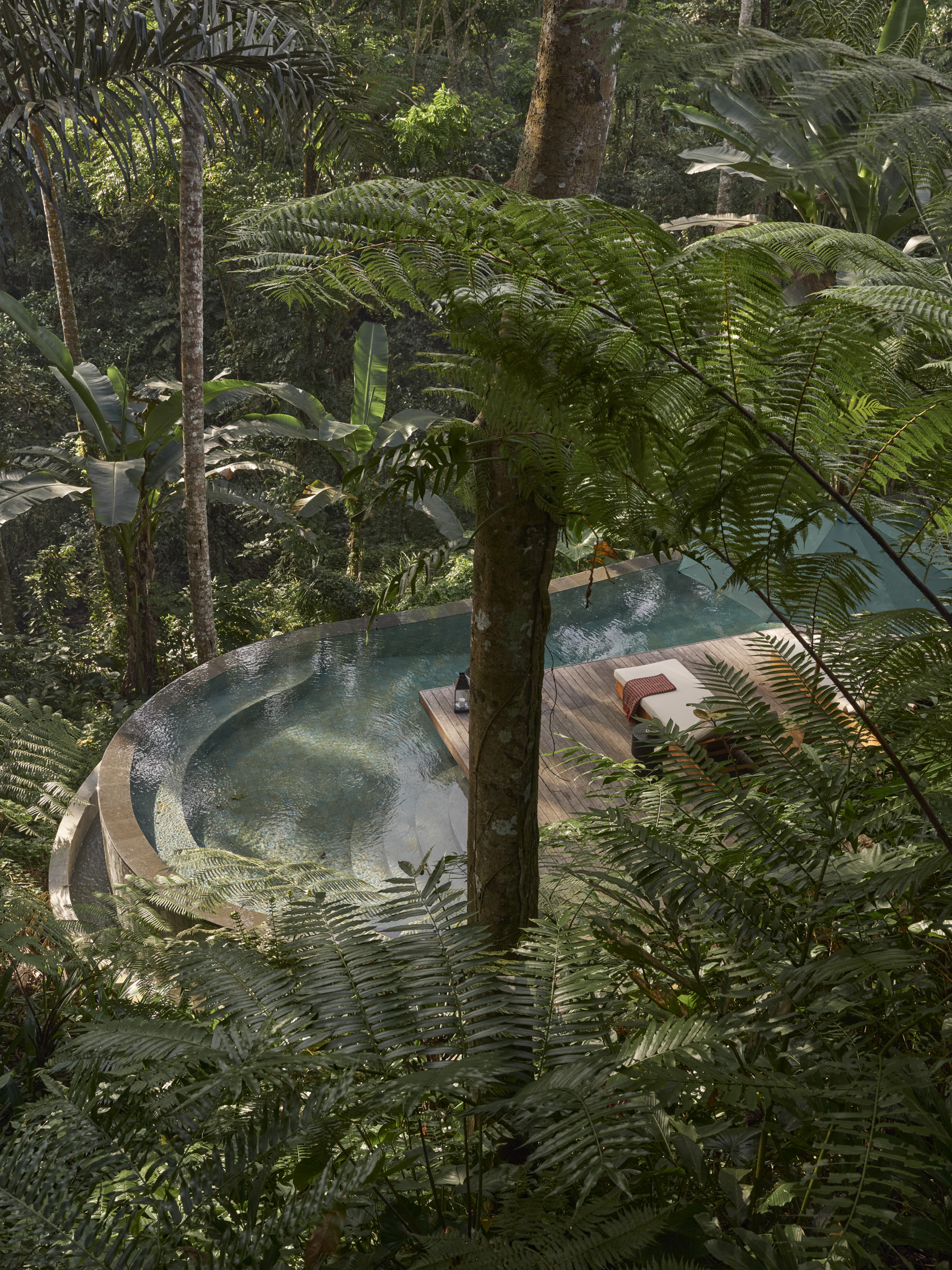 Looking down at the swimming pool and the landscape