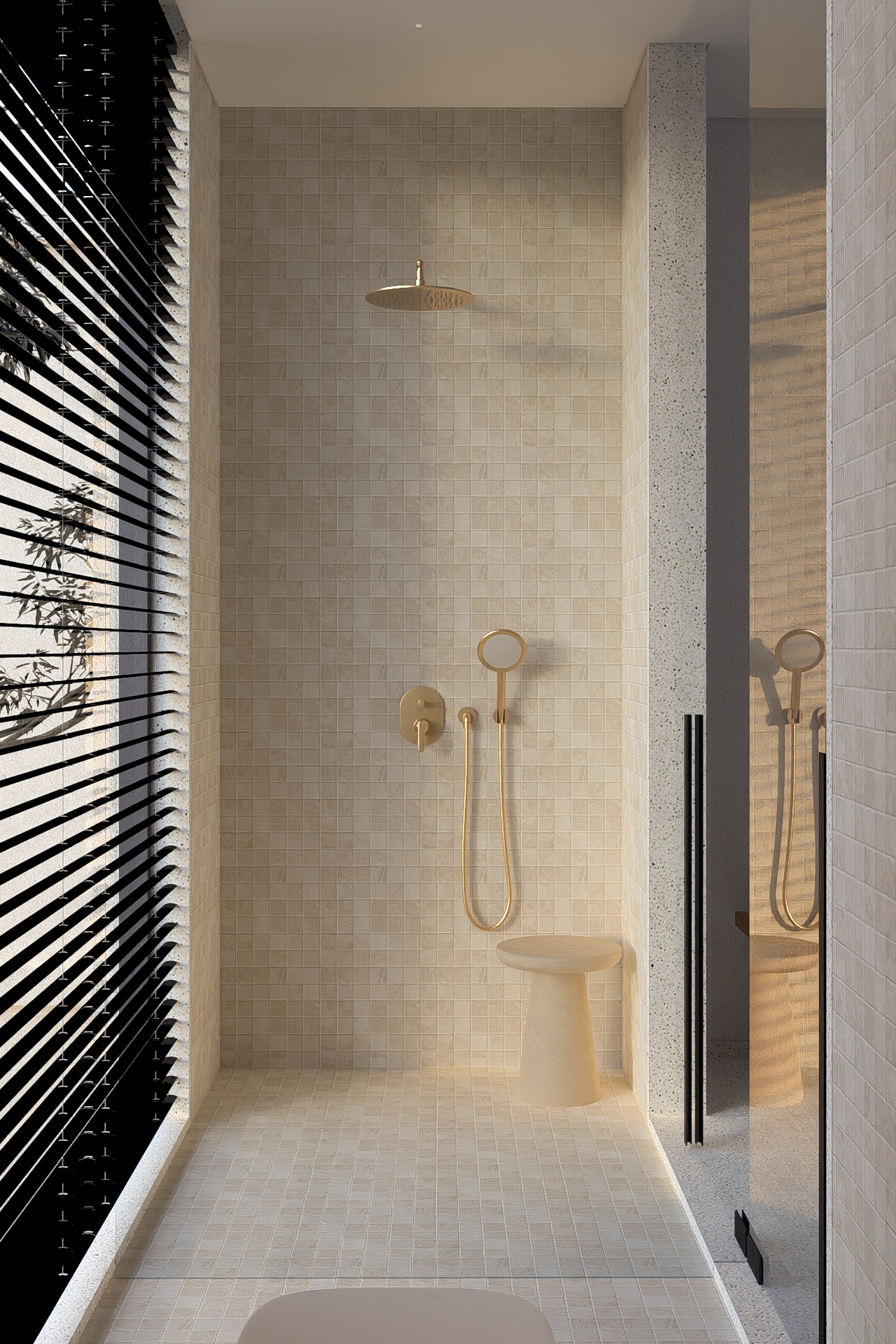 View of shower space at typical bathrooms finished in tumbled marble using brushed french gold sanitary ware 