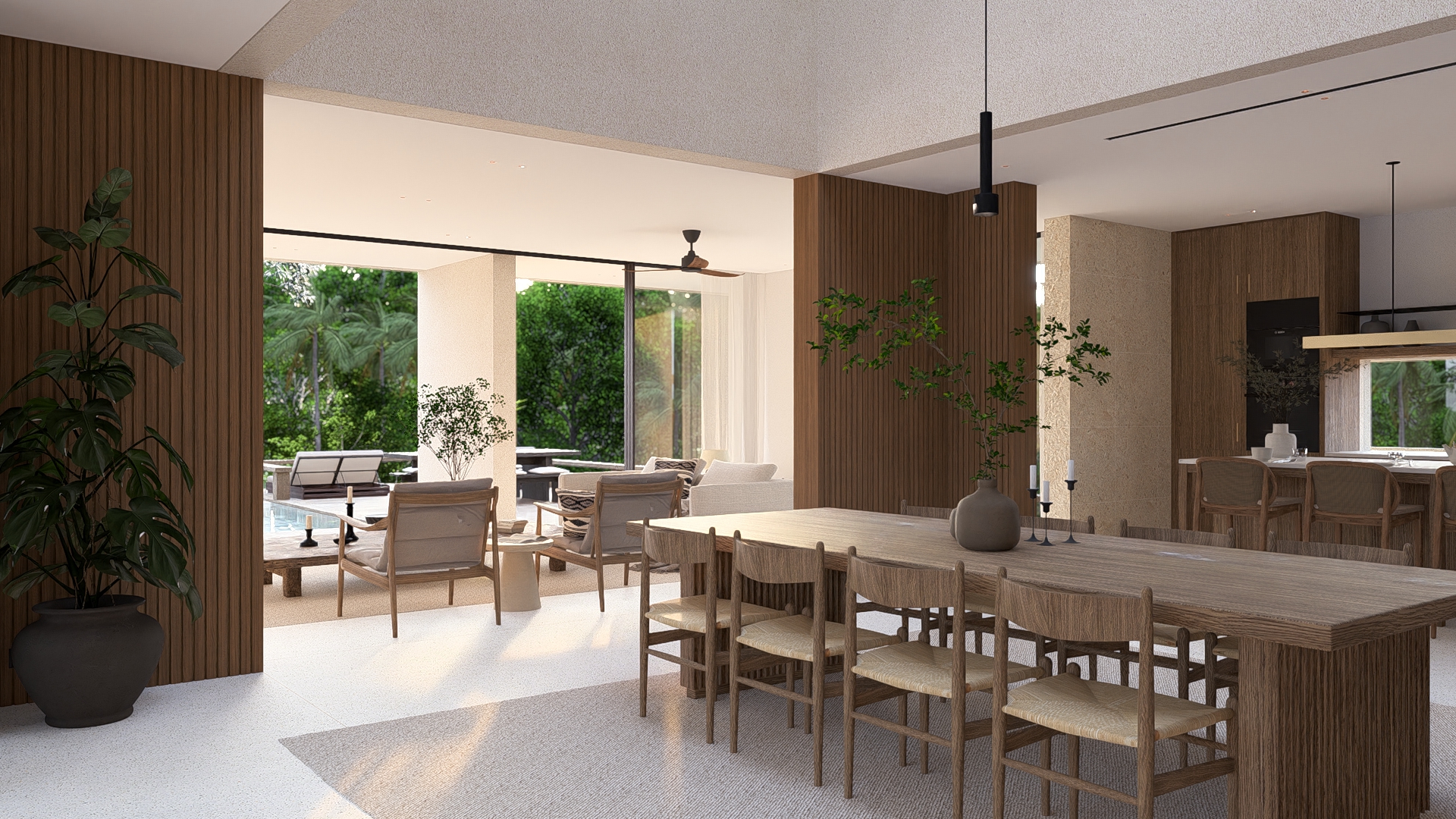 View of the great room at padang linjong residence showing the dining space, living room, and kitchen island