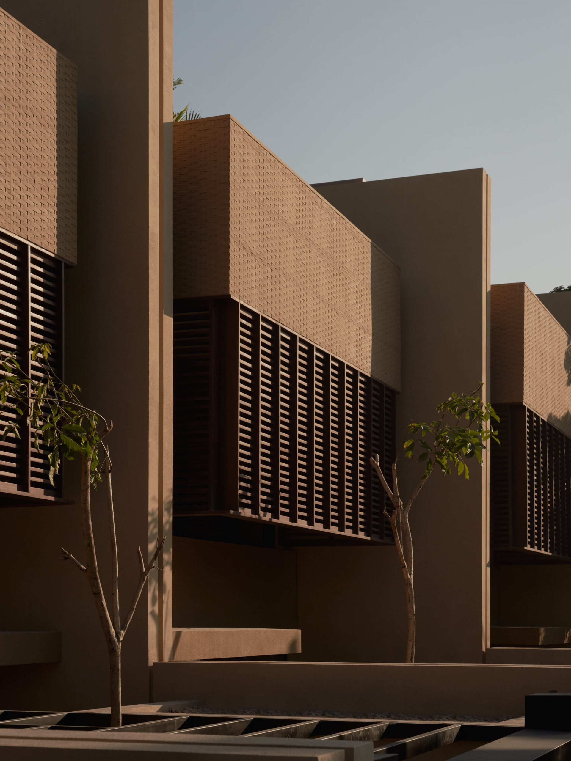 Leaf Berawa Facade with wooden screen and bamboo texture pressed feature wall