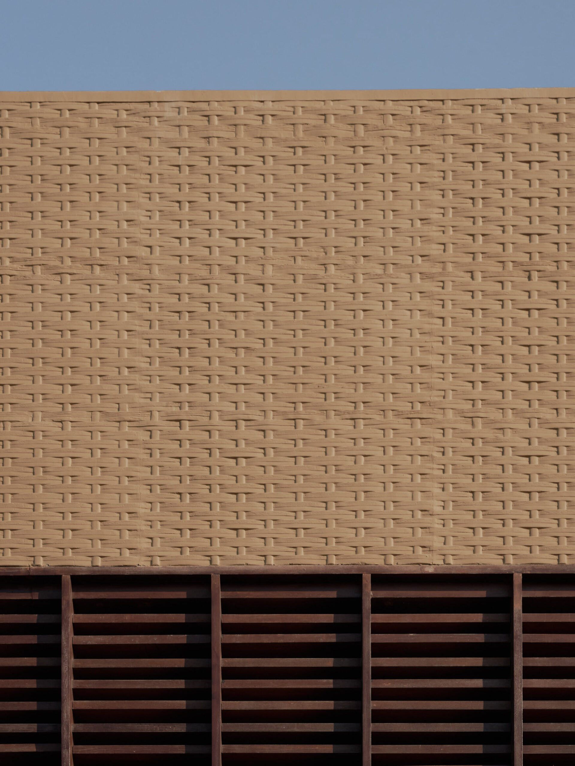 Facade detail of bamboo pressed concrete walls