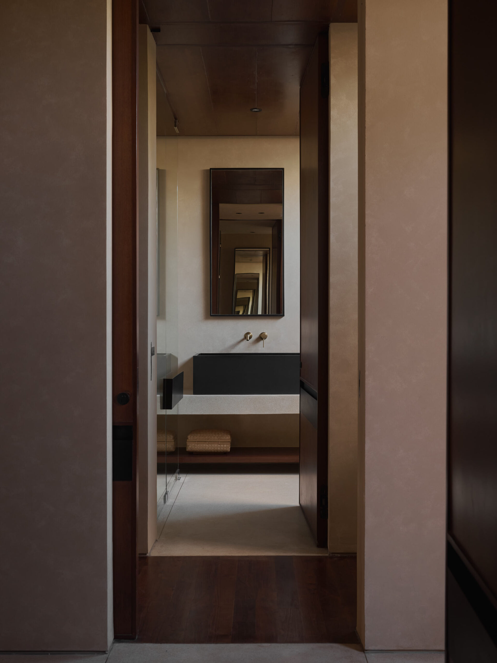 Layering of walls looking into the ground floor bathroom