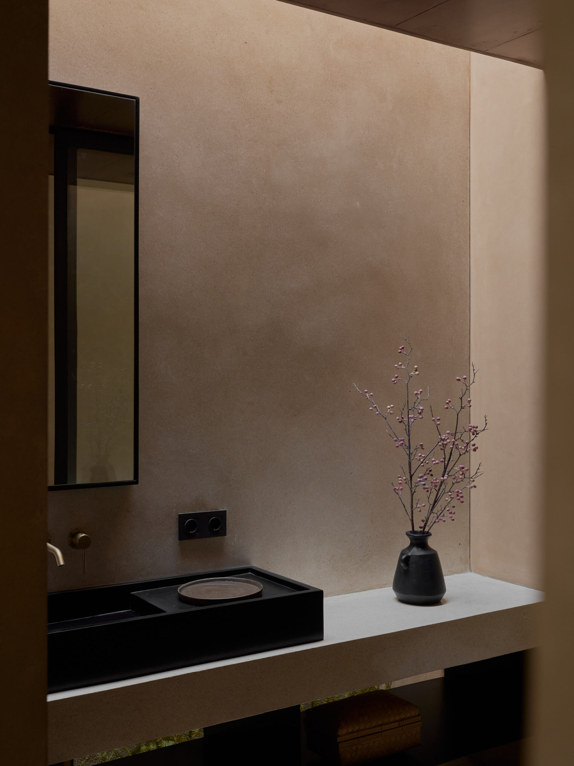 Guest bathroom with skylight and floating vanity counter