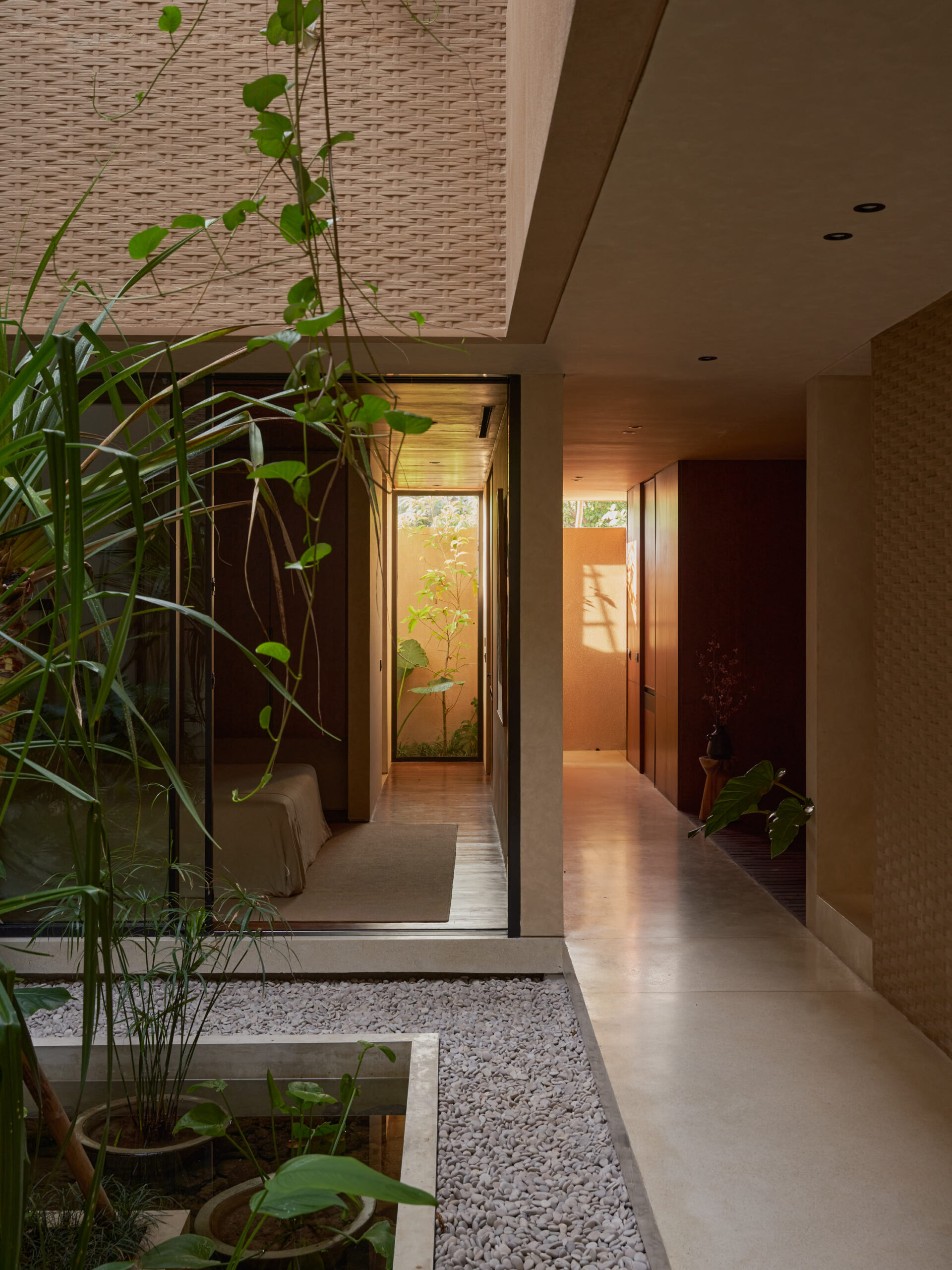 Inner courtyard view looking towards the entrance corridor through the ground floor bedroom