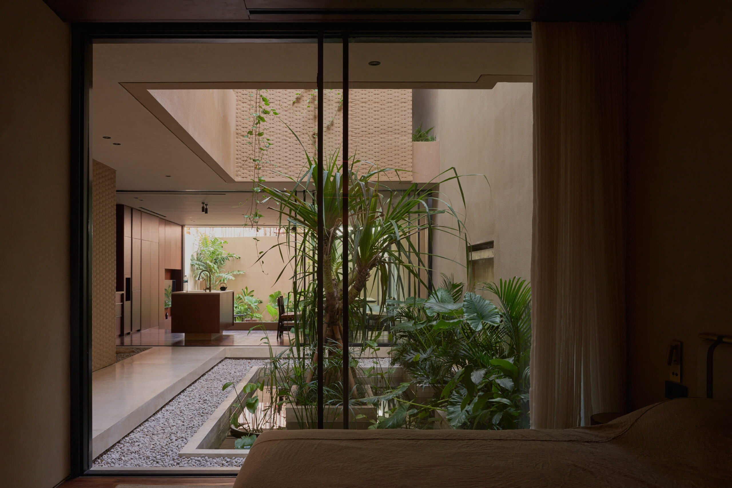 Horizontal view of the ground floor bedroom looking towards the inner courtyard