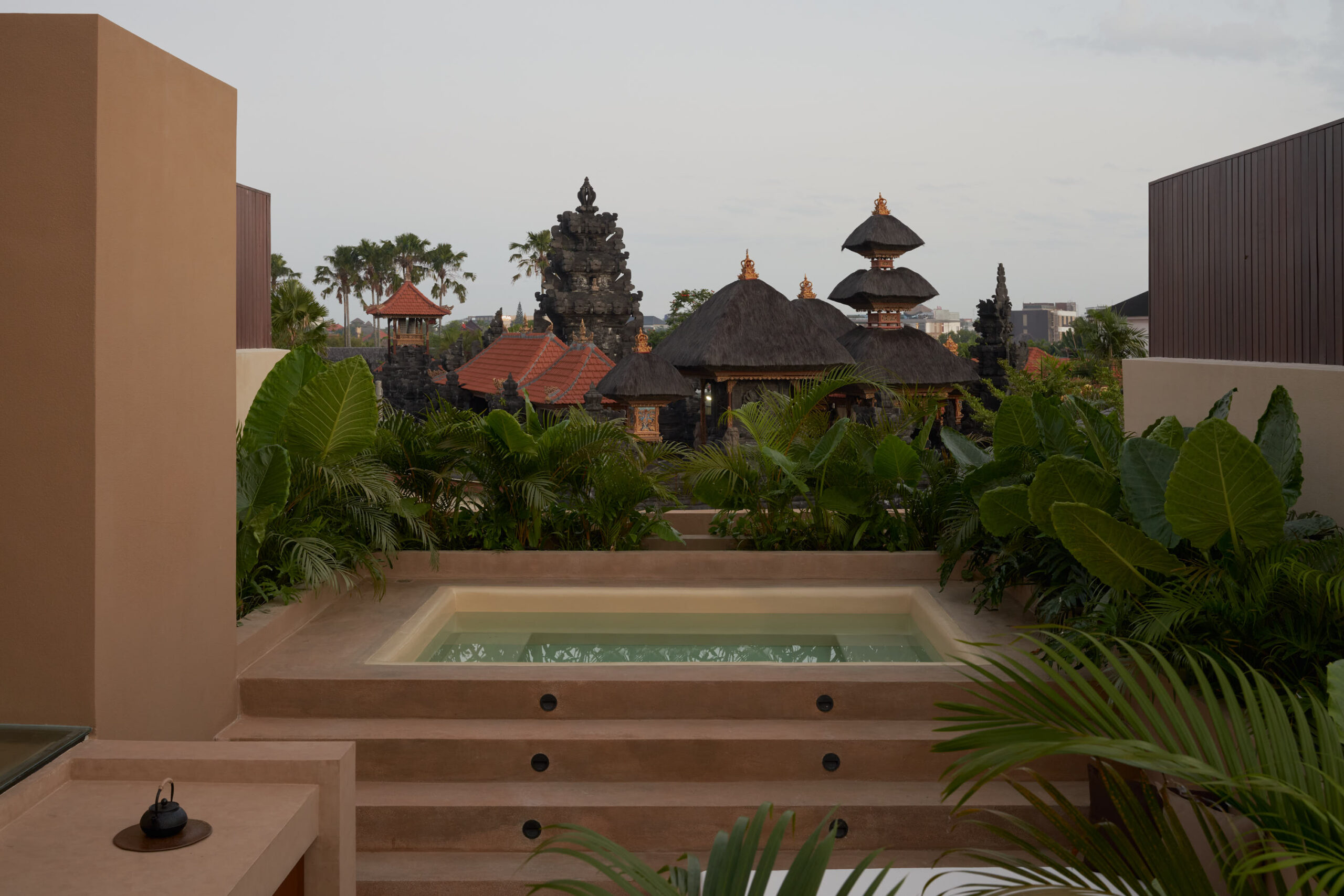 Roof top plunge pool overlooking the balinese temple