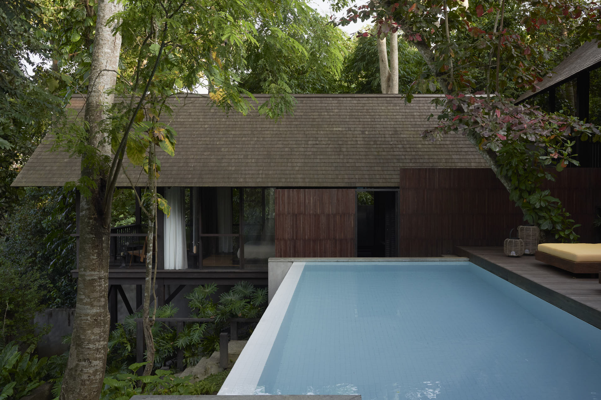 View overlooking the swimming pool towards a bedroom pavilion