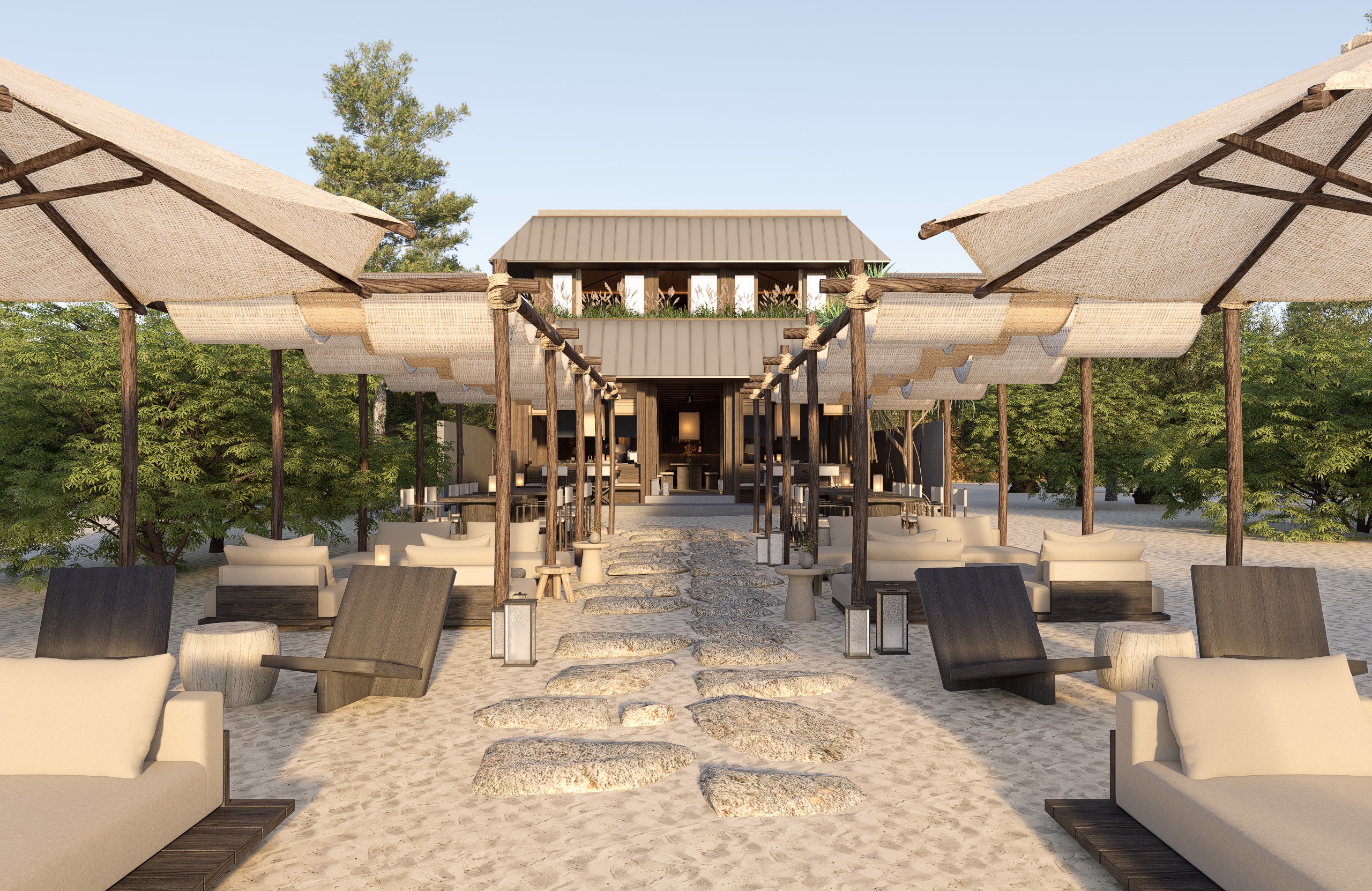 Umah Meno facade from the beach showing outdoor seating and whole building